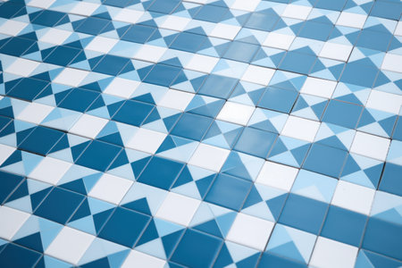 Blue and white mosaic tiles wall background. Abstract background and texture for design.の素材