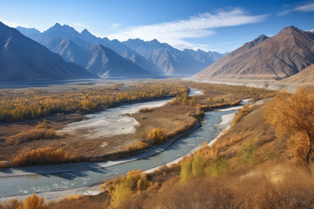 Autumn mountain landscape with river and blue sky, Kyrgyzstanの素材