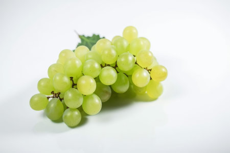 Green grapes on a white background. Isolated on a white background.の素材