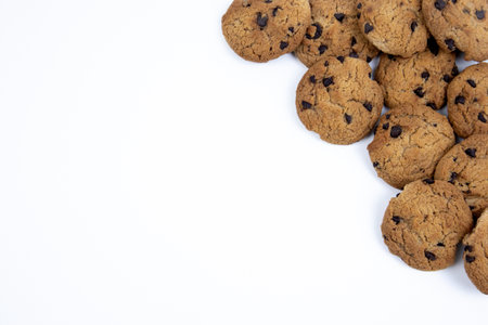 Chocolate chip cookies on white background with copy space for text.の写真素材