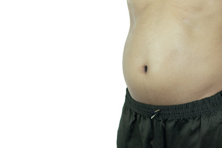 Men with pot bellies or belly fat. Close-up of body partsの写真素材