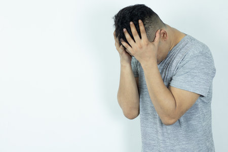 men are stressed, sad and depressed about life circumstancesの写真素材