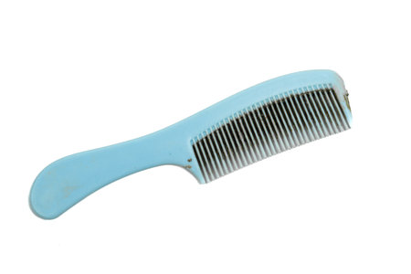 Dirty hair comb isolated on white background. Personal hygieneの写真素材
