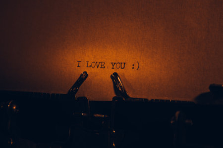 I LOVE YOU typed words on a vintage typewriter. Close up. Antique Typewriter.の写真素材