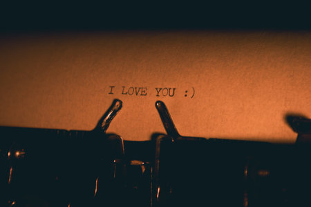 I LOVE YOU typed words on a vintage typewriter. Close up. Antique Typewriter.の写真素材