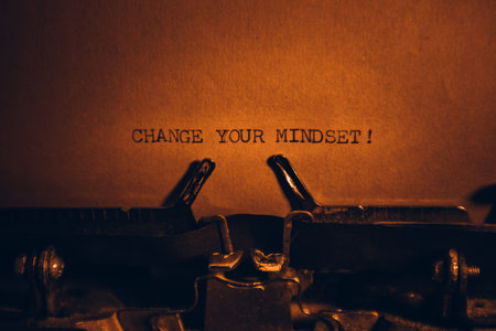 CHANGE YOUR MINDSET! typed words on a vintage typewriter. Close up. Antique Typewriter.の写真素材