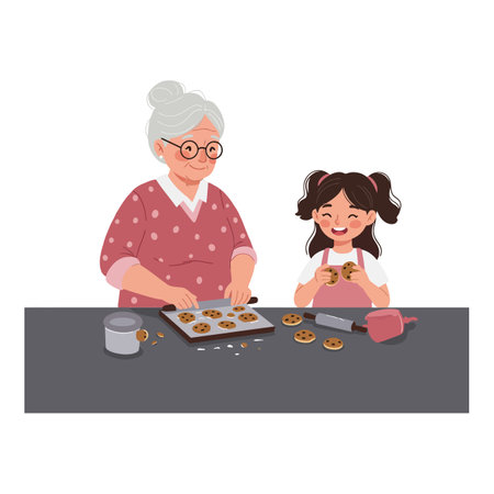 The granddaughter smiles as they finish baking cookies.のイラスト素材