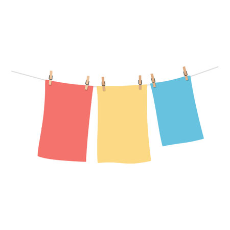 Three vibrant clothes in red, yellow, and blue hang from a line, showcasing a cheerful and fresh atmosphere.のイラスト素材