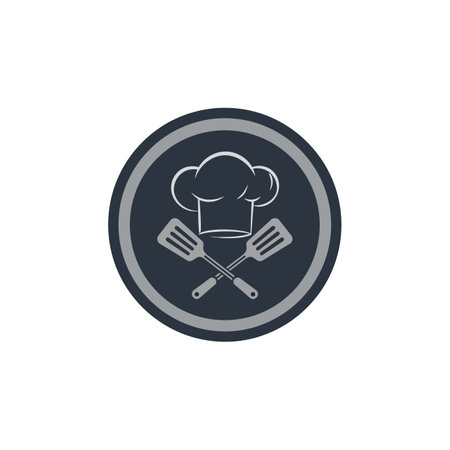 A simple circular badge featuring a chef hat and two crossed spatulas in a minimal flat style with monochrome gray tones.のイラスト素材