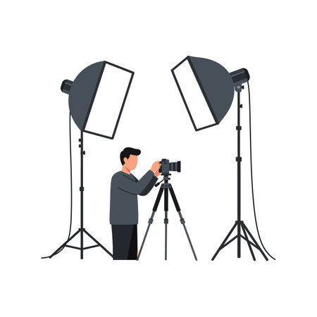 A man in dark clothing sets up a camera on a tripod, surrounded by two large professional studio lights, creating a focused and professional atmosphere.のイラスト素材