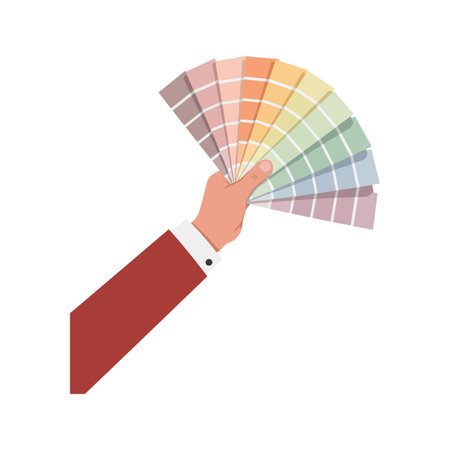 Illustration shows a hand holding a color palette fan with muted pastel paint swatches in an organized layout. Creative and calm mood.のイラスト素材