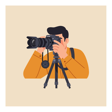 Illustration shows a photographer using a camera mounted on a tripod, wearing an orange shirt,...