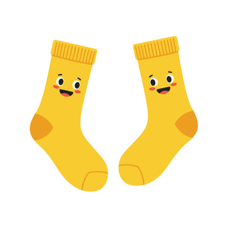This vector shows two yellow socks with cheerful smiling faces in a playful design. The image conveys fun and happiness.のイラスト素材