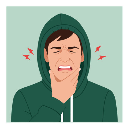 Illustration shows young man wearing green hoodie holding his chin with pain expression indicating sore throat discomfort. Calm mood.のイラスト素材