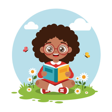 A happy girl with curly hair and red glasses reads a colorful book while sitting on grass with flowers and butterflies, cheerful mood.のイラスト素材
