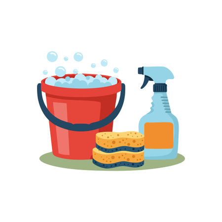 Illustration shows red bucket filled with soap bubbles, two yellow sponges, and a blue spray bottle, representing cleaning tools in a simple style. Cheerful.のイラスト素材
