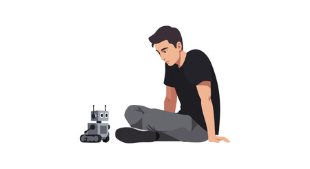 Young man sits cross-legged on the floor facing a small robot, engaging in a moment of curiosity and...