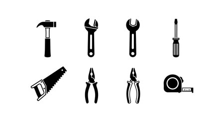 Vector illustration displays various construction tools including hammer, adjustable wrench, saw, pliers, screwdriver, and tape measure in black silhouette style. Practical and clear.のイラスト素材
