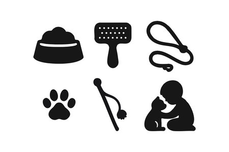 This vector set shows essential pet care items and interaction with a dog, including feeding, grooming, playing, and walking tools in black silhouette style. Friendly mood.のイラスト素材