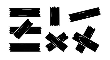 Vector image shows multiple black tape pieces with rough torn edges arranged in different orientations on white background, suitable for design and decoration, simple and bold mood.のイラスト素材