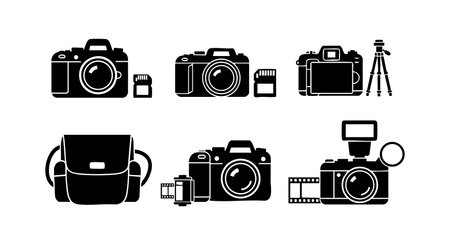 Set of black silhouette camera equipment including digital cameras, memory cards, tripod, and camera bag in vector style. Simple design, clear shapes, technical theme, minimalistic mood.のイラスト素材