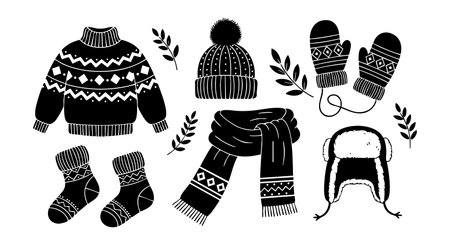 This vector illustration shows a winter clothing set including a sweater, hat, mittens, socks, scarf, and trapper hat in black and white style, perfect for cold seasons. Cozy mood.のイラスト素材