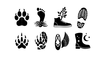 This vector features black silhouette icons of animal paws, human footprints, various shoe prints, and winged shoes, showing diverse track designs in a minimalist style. Creative and abundant.のイラスト素材