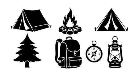 This vector illustration shows black silhouettes of camping gear including tents, a campfire, backpack, compass, lantern, and pine tree representing outdoor adventure and nature mood.のイラスト素材