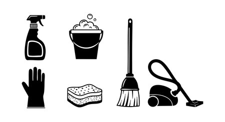 Collection of cleaning tools including spray bottle bucket with foam gloves sponge broom and vacuum cleaner shown in simple black and white style with clear silhouette mood practicalのイラスト素材