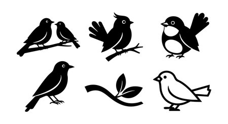 This vector illustration features black silhouette birds perched and flying around a branch with leaves in a simple and clean design style perfect for nature themes calm mood.のイラスト素材