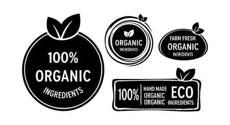 A bold black and white vector set shows organic and eco friendly labels with leaf motifs perfect for natural product branding and sustainable packaging designs, clean and modern styleのイラスト素材