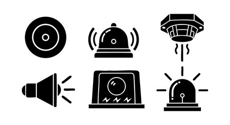 A bold vector illustration displays a set of black security alarm icons including sirens, bells, and smoke detectors in a clean style suitable for safety designs edgyのイラスト素材