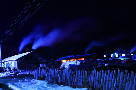 winter night scene in a villageの写真素材