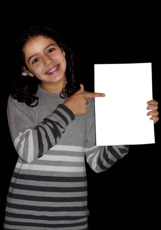 Child pointing to the white cardの写真素材