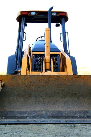 Close up of a bulldozer in a construction sight.