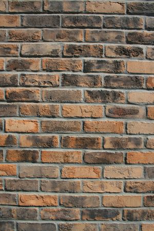 Close up of a brickwall showing unique pattern.