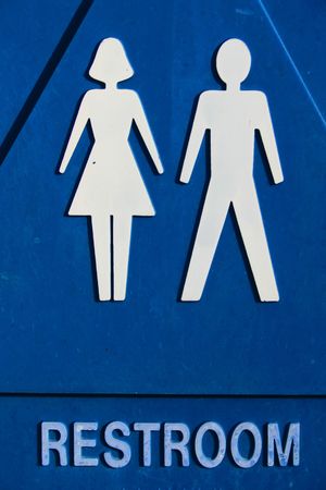 Close up of a unisex restroom sign.の写真素材