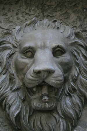 Lion head fountain showing unique design and details.の写真素材
