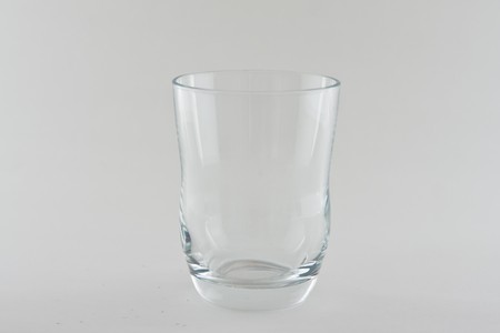 a transparent glass with a white backgroundの写真素材