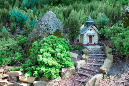 Miniature church with tiny forest in the backgroundの写真素材