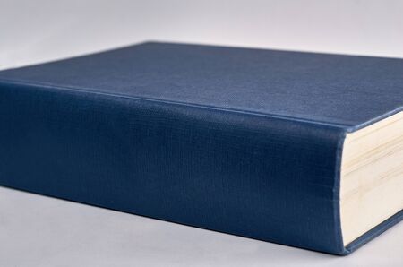 blue book on white background with copyspaceの写真素材