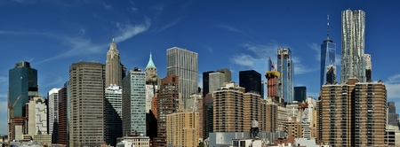The Freedom Tower, Wall Street, and the skyline of downtown Manhattan from New York Harbor.の写真素材