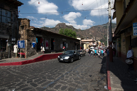 Tepoztlan, Morelos, Mexico - 2019: A typical cobblestone street at the historic town center.のeditorial素材