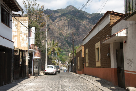 Tepoztlan, Morelos, Mexico - 2019: A typical cobblestone street at the historic town center.のeditorial素材