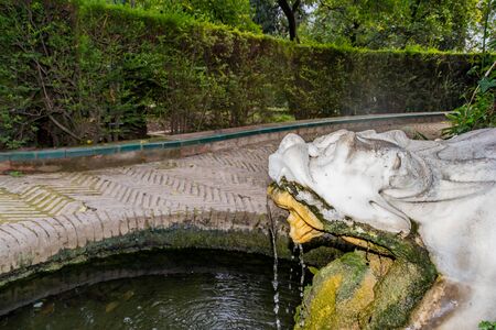 Seville, Andalusia / Spain - November 4, 2018: gargoyle fountain view, Real Alcazar, UNESCO Humanity Heritage.のeditorial素材