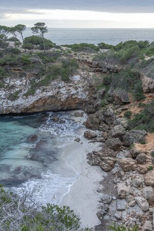 Vertical seascape in Es Calo des Moro, a famous beach in Santanyi, Majorca, without people.の写真素材