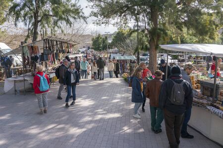 Sineu, Mallorca / Spain - February 5, 2020: crowd strolling through the weekly Wednesday market, where textile products, typical food and second-hand items are soldのeditorial素材