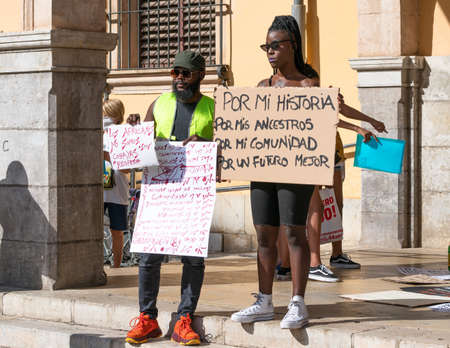 Palma, Majorca, Spain - June 7, 2020: Couple of African American protesters in demonstration against racism and police violenceのeditorial素材