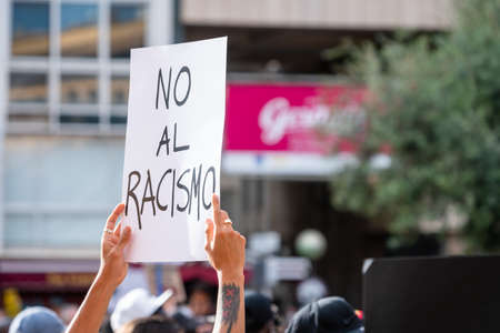 Palma, Majorca, Spain - June 7, 2020: Hands holding a banner at anti racism demonstrationのeditorial素材
