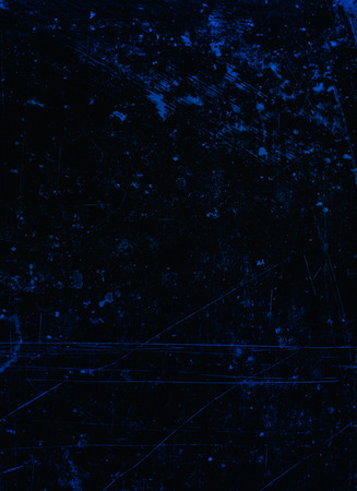 Abstract background textured in blue violet and black tones with scratches and stains.の写真素材